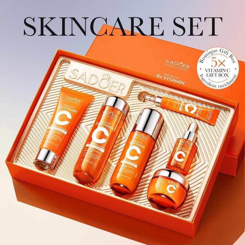 Sadoer skincare set with various products in an orange box on a light background