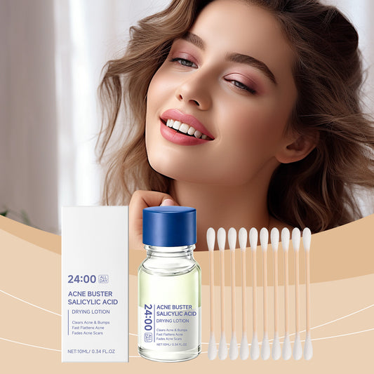 Skincare product set with bottle, box, and applicators on a neutral background